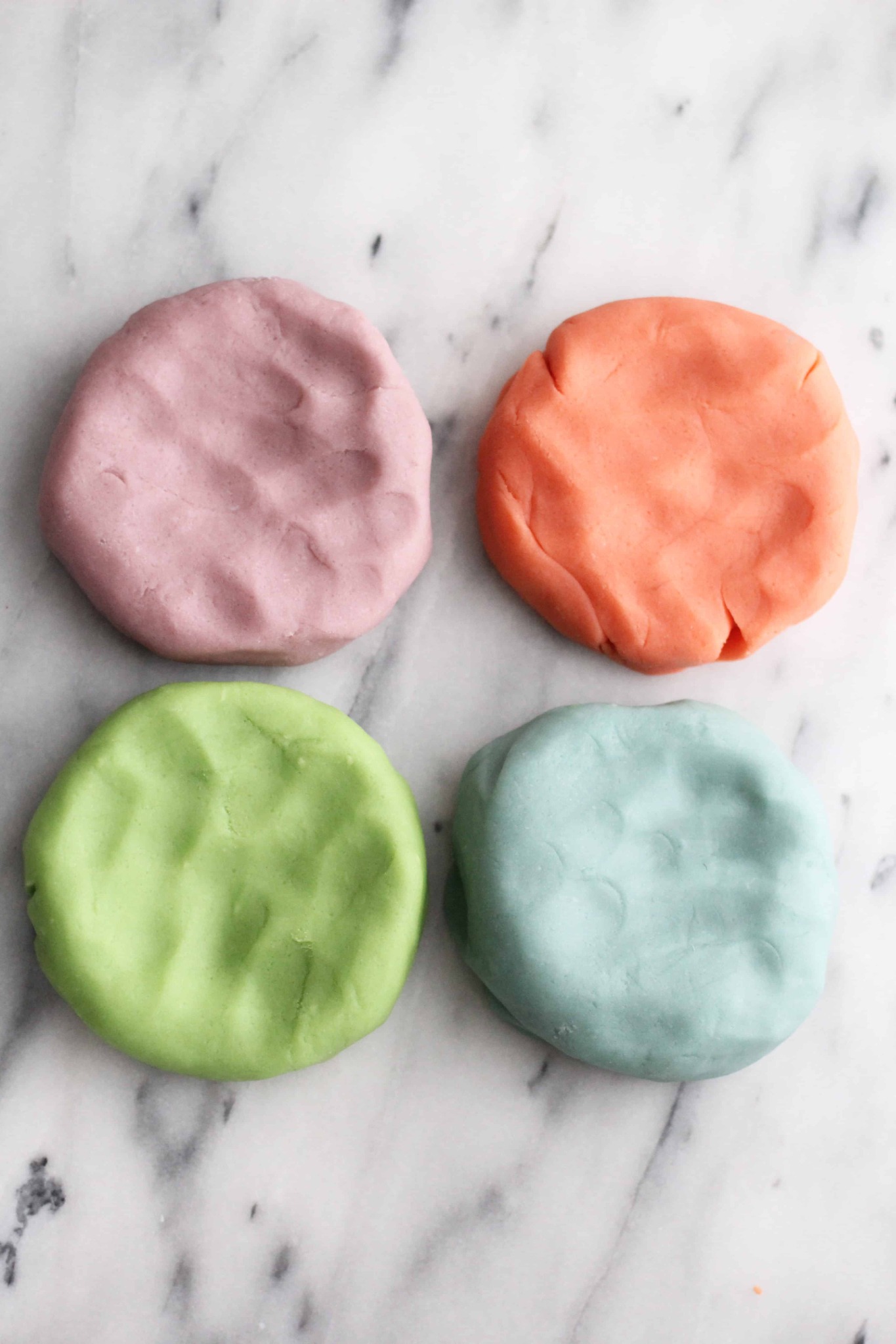 Four colourful pieces of aroma dough